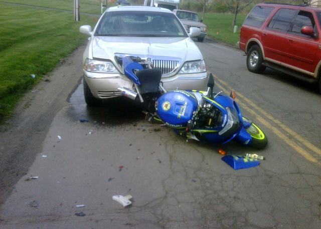 Motorcycle and car collision on Peck Lane near Grandview Court on 04.13.2010